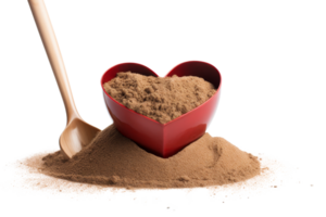 A spoon is laying on top of a red bowl filled with brown powder. The spoon is positioned in the center of the bowl, and the powder is spread out around it. Concept of warmth and comfort png