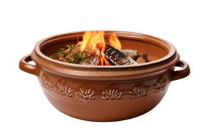 A large brown pot with a fire burning inside. The pot is filled with food and has a design on it png