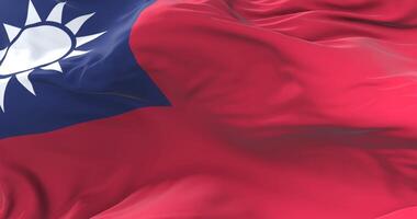 Taiwan flag waving at wind in slow in blue sky, loop video