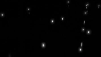 Stream of rising luminous particles on black background. Design. Bright particles are moving up rapidly. Rising luminous particles with reflection effect on black background video