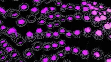 Wavy texture of black and colored circular shapes on a black background. Motion. Technological pattern. video