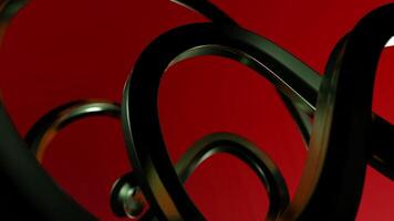 Abstract metal curving tubes with source of light. Design. Moving 3D stripes on a red background. video