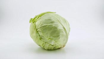 fresh cabbage on white background with crisp texture and vibrant green leaves photo
