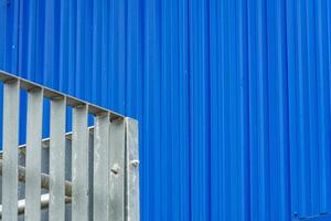 A close up of steel beams creating a geometric pattern in a modern urban architectural structure. The composition showcases industrial design and engineering precision photo