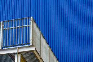 A close up of steel beams creating a geometric pattern in a modern urban architectural structure. The composition showcases industrial design and engineering precision photo