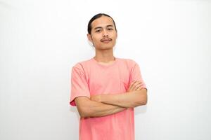An Indonesian, Asian man wearing a pink tshirt formal style involving his partner with standing confidence like a mature person and a young businessman. isolated in white background photo