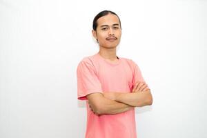 An Indonesian, Asian man wearing a pink tshirt formal style involving his partner with standing confidence like a mature person and a young businessman. isolated in white background photo