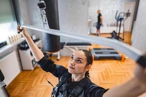 Empowering workout session in a modern fitness studio photo