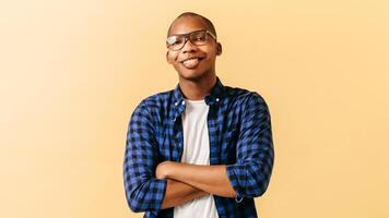 portrait of a smiling young african american man looks at the camera. photo