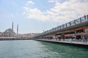 Istanbul, Turkey, May 02, 2023 View of the mosque in cloudy weather over the Bosphorus and Kadika. photo