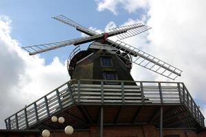 fan blades that are turned by the wind photo