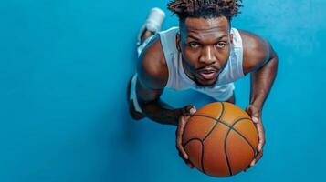 A basketball player prepares to shoot while lying on the court, showcasing dedication and skill photo