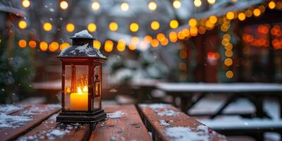 Warm lantern glowing on a snowy evening with festive lights in a cozy outdoor setting photo