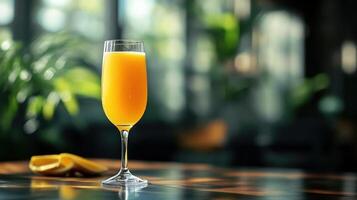 A refreshing cocktail served at a bar. Garnished with orange zest and slices, photo
