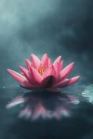 A tranquil pink lotus flower floating gracefully on a serene water surface at dawn photo