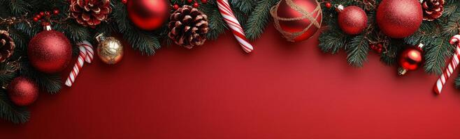 Festive holiday decorations with ornaments and candy canes on a red backdrop photo