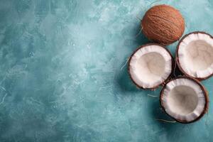 Coconut Halves on Blue Background photo