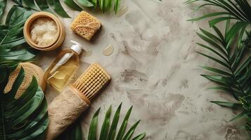 Bottle of Soap, Brush, and Plants on Table photo