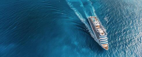 Luxury Cruise Ship Sailing Through Clear Blue Ocean Waters photo