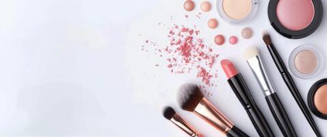 Pink Makeup Products on White Background photo