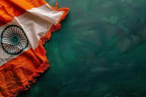 Indian Flag Draped on Green Concrete Background photo
