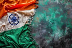 Indian Flag Draped on Green Concrete Background photo