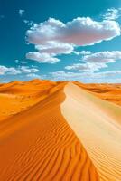 Expansive desert landscape with golden sand dunes under a bright blue sky and fluffy clouds photo