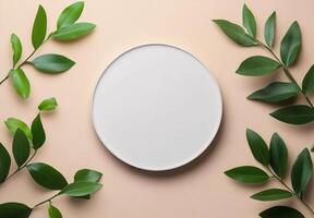 Circular white object on a table surrounded by green plants in natural light at midday photo