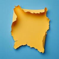 Bright yellow torn paper on a blue background highlighting creative design possibilities photo
