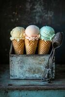 Three colorful ice cream cones displayed in a vintage wooden box on a dark surface photo