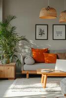 Cozy living room in a bright space featuring plants and warm colored cushions during daylight photo