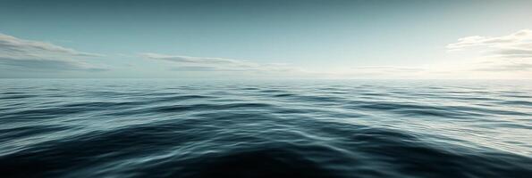 Serene view of calm ocean waters under a bright sky at dawn with subtle waves reflecting sunlight photo