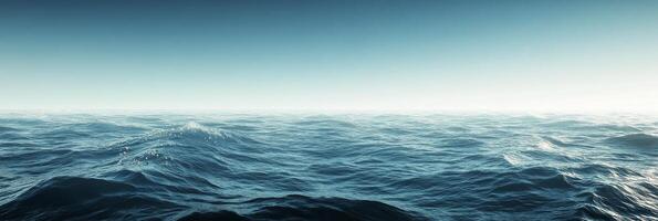 Serene view of calm ocean waters under a bright sky at dawn with subtle waves reflecting sunlight photo