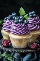 Delicious cupcake topped with cream and berries on a dark surface, perfect for dessert lovers photo