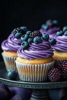 Delicious cupcake topped with cream and berries on a dark surface, perfect for dessert lovers photo