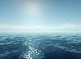 Calm ocean view under a bright sun with clear skies during midday photo