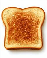 Toasted slice of bread with golden brown crust on a neutral background ready for toppings photo