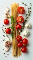 Fresh ingredients for a delicious pasta dish arranged on a white background photo