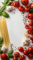 Fresh ingredients for a delicious pasta dish arranged on a white background photo