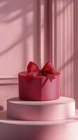 Decorative pink gift box with a heart ribbon in a bright room during daytime photo