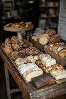 Freshly baked breads and pastries displayed on wooden shelves in a rustic bakery photo