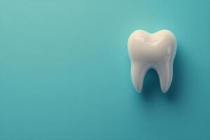 A detailed view of a healthy human tooth on a blue background showcasing dental anatomy clearly photo