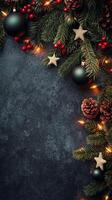 Festive Christmas wreath design featuring ornaments and pine cones on a dark background photo