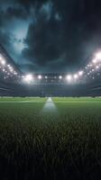 Expansive sports stadium illuminated at night with dramatic clouds overhead photo