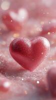 A close up of a sparkling heart shaped decoration on a pink background, perfect for celebrations photo