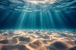 Beneath the ocean waves, sunlight filters through tranquil waters at midday photo