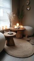 A cozy interior setting featuring candles and flowers on a wooden table in a serene atmosphere photo
