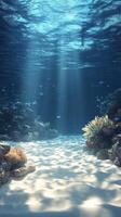 Bright sunlight filters through clear ocean water, illuminating the sandy seafloor and coral reef photo