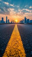 Sunset view of Toronto skyline with the CN Tower from a wide road in the foreground photo