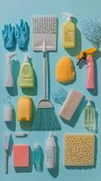 A variety of cleaning supplies arranged on a light blue backdrop for home organization photo